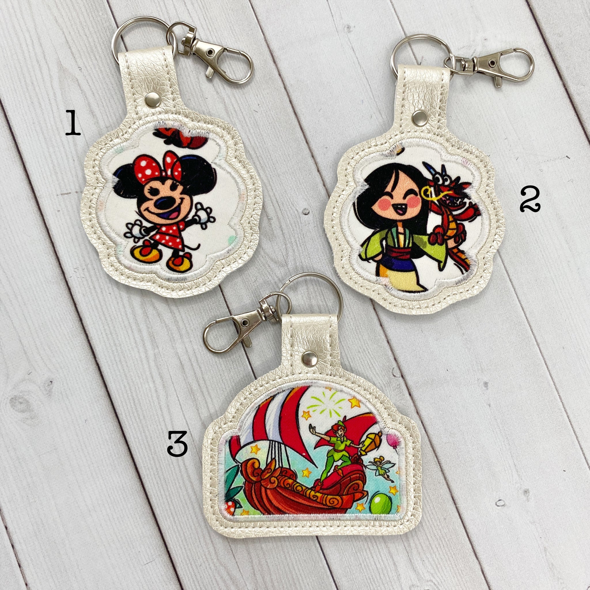 Keyrings - Mouse, Warrior Girl, & Classic Flying Theme Park Ride